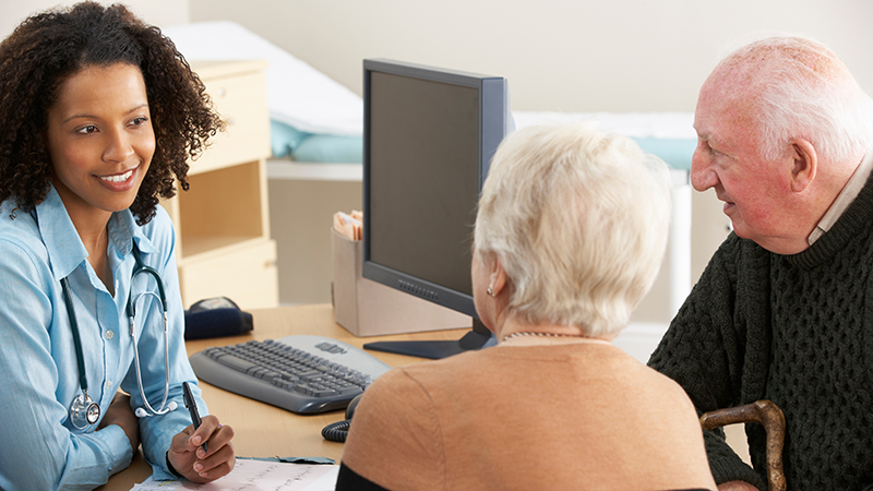 Healthcare Professional talking to patients.