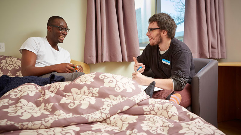 Male nurse providing care in the home